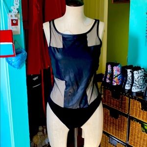 Black faux leather and chiffon bodysuit.